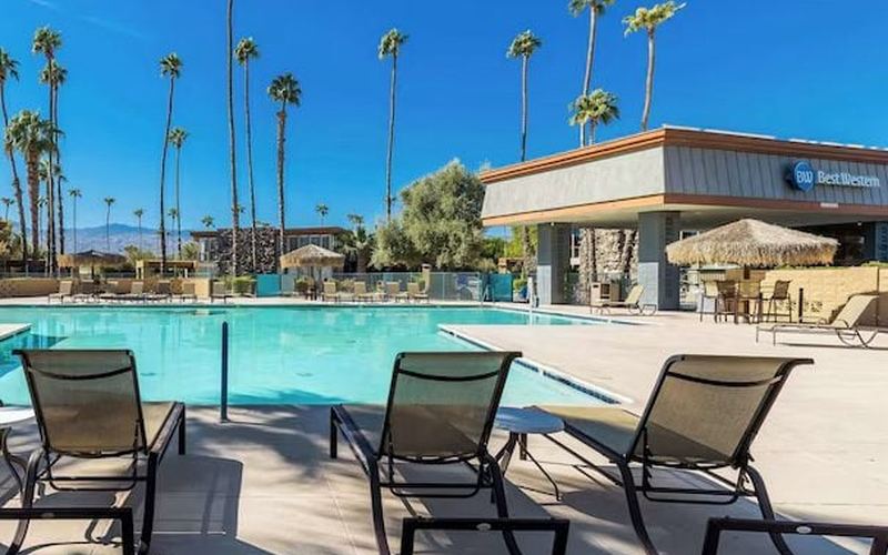Pool deck and loungers at the Best Western Date Tree in Indio