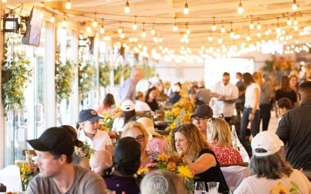 Guests at tables in the VIP Palm Club at Desert International Horse Park