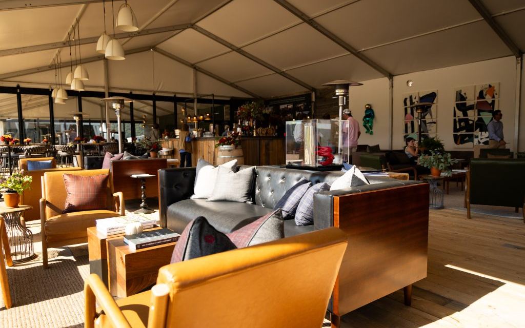 Lounge seating in the hospitality tent at Highlands