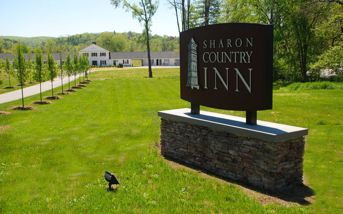The Sharon Country Inn sign on the lawn