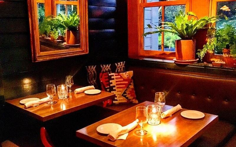 A candlelit table at The Woodland