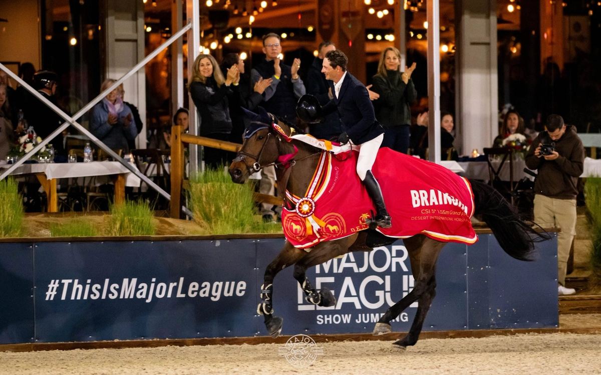 A rider waves to the crowd during an MLSJ win in Palm Springs
