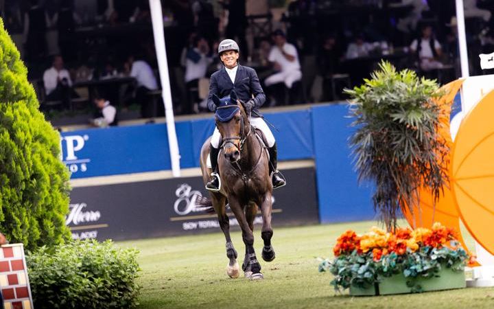 A rider in the main arena at Club Hípico La Silla