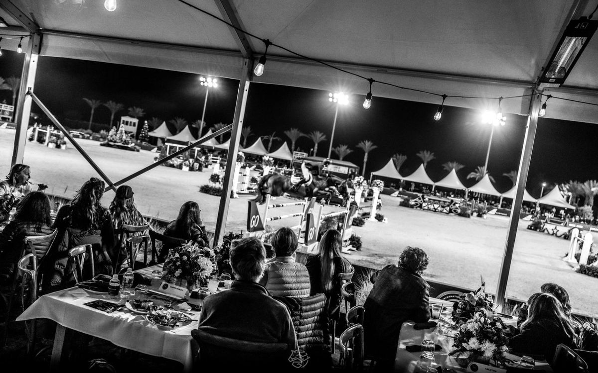 Spectators dining beside the arena at an MLSJ evening in Palm Springs