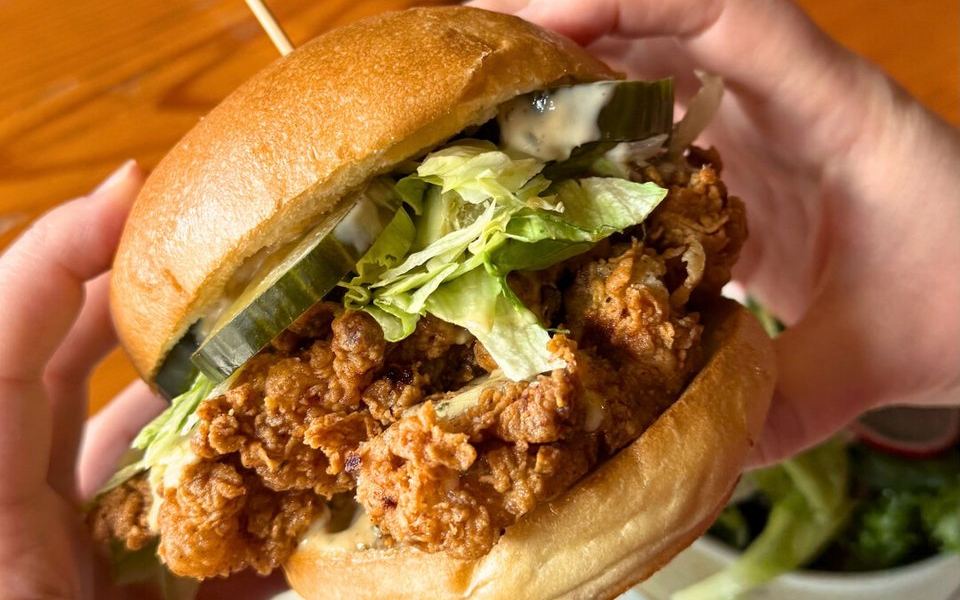 A fried chicken sandwich at Miijidaa Café + Bistro